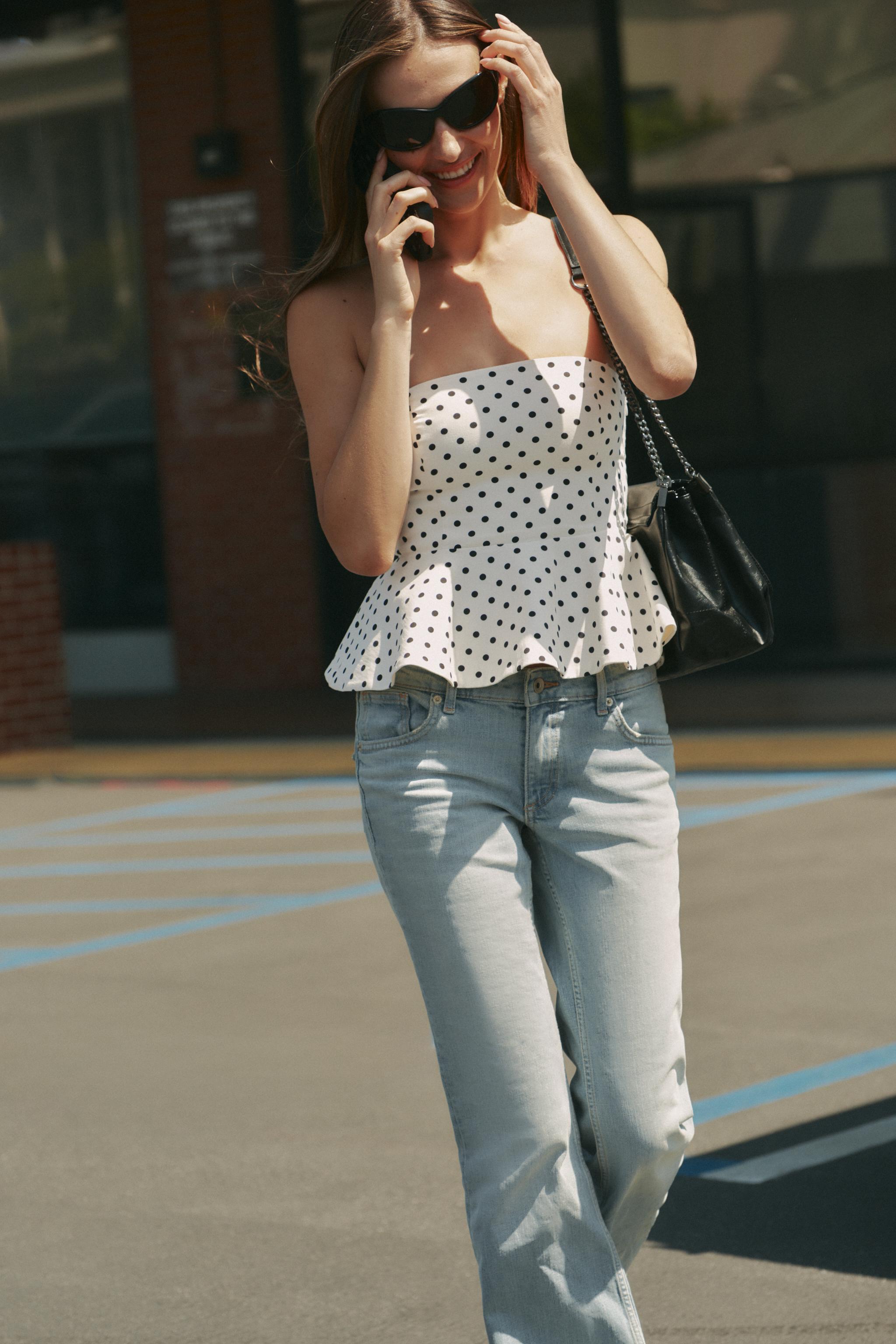 TOP BUSTIER PÉPLUM À POIS